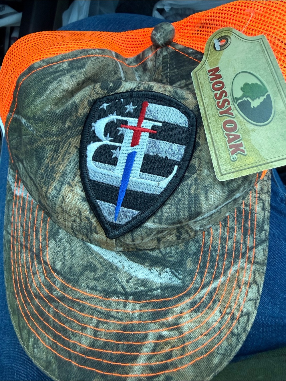 Mossy Oak Men’s Camo Trucker Hat with Back the Line